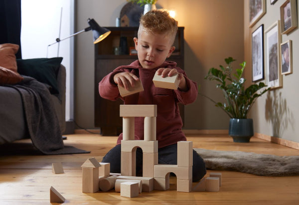 Waarom houten speelgoed goed is voor de ontwikkeling van je kind